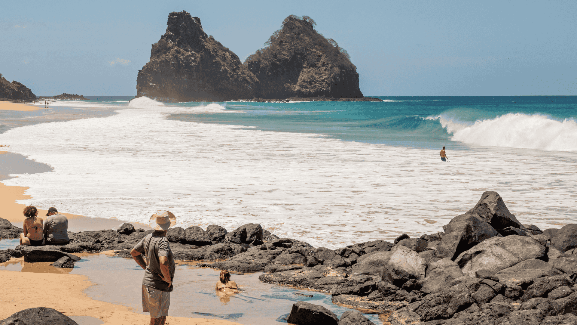 People on the beach in Fernando de Noronha_Camila Saunier International Realty